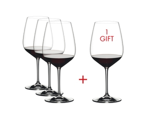 RIEDEL Heart to Heart Cabernet Sauvignon filled with a drink on a white background