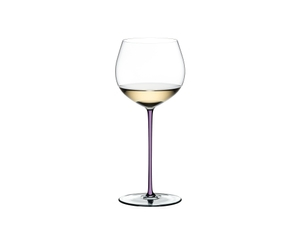 A RIEDEL Fatto A Mano Oaked Chardonnay glass in violet filled with white wine on a transparent background. 