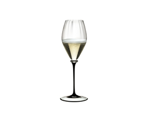 RIEDEL Fatto A Mano Performance Champagne Glass - black stem filled with a drink on a white background