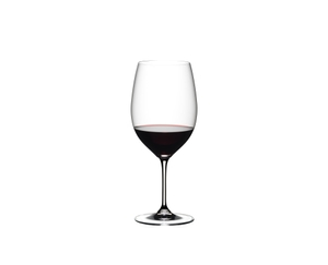 RIEDEL Vinum + Gift filled with a drink on a white background
