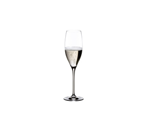 RIEDEL Vinum Cuvée Prestige filled with a drink on a white background