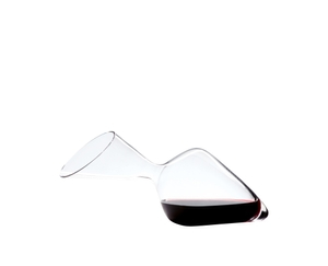 RIEDEL Decanter Tyrol filled with a drink on a white background