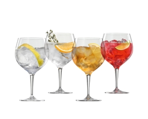 SPIEGELAU Special Glasses Gin & Tonic Stemmed filled with a drink on a white background