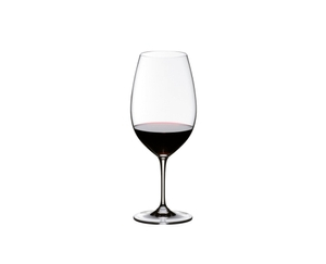 RIEDEL Vinum Syrah/Shiraz filled with a drink on a white background