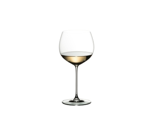 RIEDEL Veritas Oaked Chardonnay filled with a drink on a white background