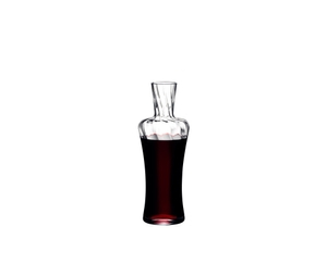 RIEDEL Medoc Decanter filled with a drink on a white background