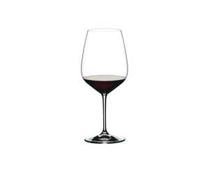RIEDEL Extreme Cabernet filled with a drink on a white background