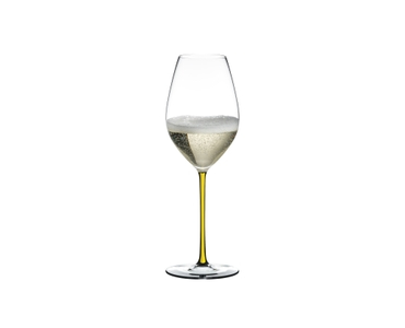 A RIEDEL Fatto A Mano Riesling/Zinfandel glass in yellow filled with white wine on a transparent background. 
