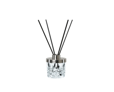 NACHTMANN Noblesse Spa Diffuser (incl. 8 aroma sticks) filled with a drink on a white background