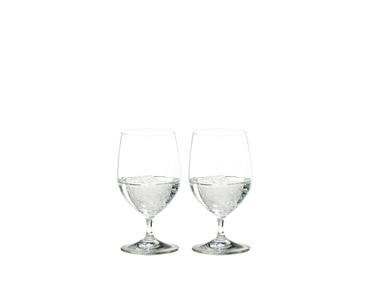RIEDEL Vinum Water filled with a drink on a white background