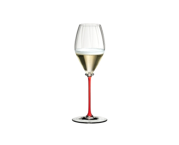 RIEDEL Fatto A Mano Performance Champagne Wine Glass - red filled with a drink on a white background