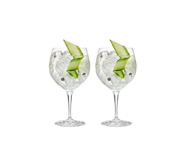 SPIEGELAU Capri Gin glass filled with a drink on a white background