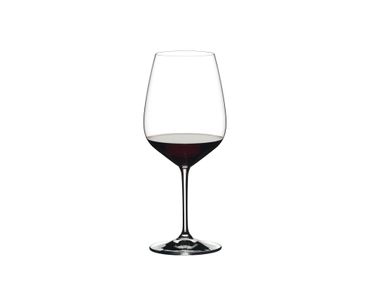 RIEDEL Extreme Cabernet filled with a drink on a white background