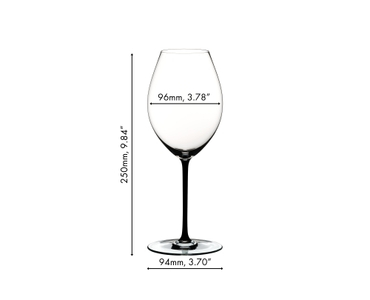 A RIEDEL Fatto A Mano Syrah glass in black filled with red wine on a white background. 
