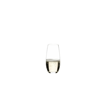 RIEDEL The O Wine Tumbler Champagne Glass filled with a drink on a white background