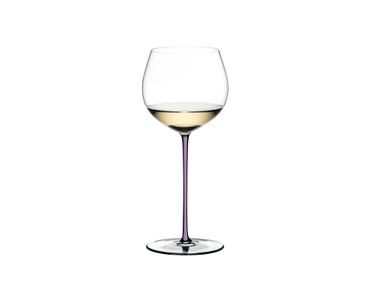 A RIEDEL Fatto A Mano Oaked Chardonnay glass in violet filled with white wine on a transparent background. 