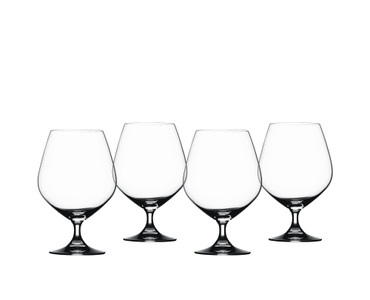 SPIEGELAU Special Glasses Brandy filled with a drink on a white background