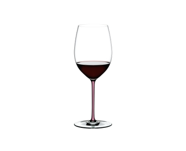 A RIEDEL Fatto A Mano Cabernet/Merlot glass in mauve filled with red wine on a transparent background. 
