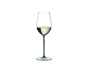 A RIEDEL Fatto A Mano Riesling/Zinfandel glass in green filled with white wine on a transparent background. 