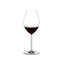 A RIEDEL Fatto A Mano Syrah glass in white filled with red wine on a transparent background. 