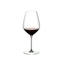 RIEDEL Veloce Syrah/Shiraz filled with a drink on a white background