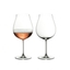RIEDEL Veritas New World Pinot Noir, Nebbiolo & Rosé Champagne Glass filled with a drink on a white background