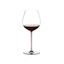 A RIEDEL Fatto A Mano Pinot Noir glass in pink filled with red wine on a transparent background. 
