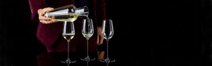 Three RIEDEL Superleggero Champagne Wine Glasses filled with Champagne