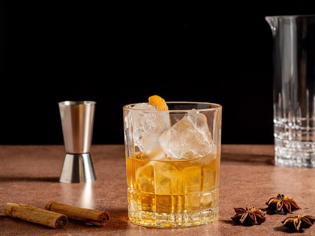 A cinnamon Old Fashioned served in a Perfect Serve Double Old Fashioned glass tumbler
