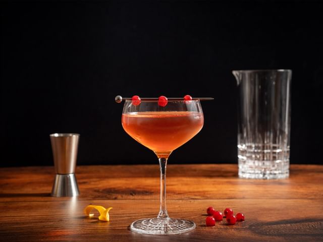 A cranberry Manhattan served in a SPIEGELAU Perfect Serve Collection Coupette Glass