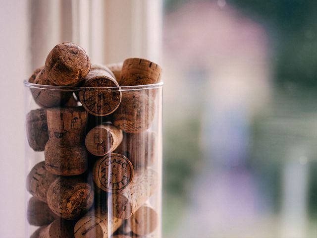 Corks stacked in a glass.